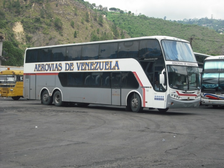 Volvo B12R I-Shift - Busscar PanorâmicoDD (en Venezuela) - Aerovías de Venezuela (087)
Colores similares a los de la argentina Andesmar (Diferencias: Fondo Blanco, Frente y Rayas descendentes después de la puerta de acceso.). Rutas Habituales: San Cristobal y Rubio (Edo.Táchira) hacia Valencia (Edo.Carabobo), Maracay (Edo.Aragua), Charallave (Edo.Miranda) y Caracas (Distrito Capital).
Palabras clave: Aerovías Busscar Volvo